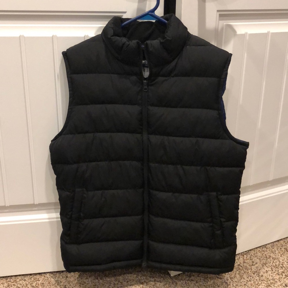 Black vest. Never worn